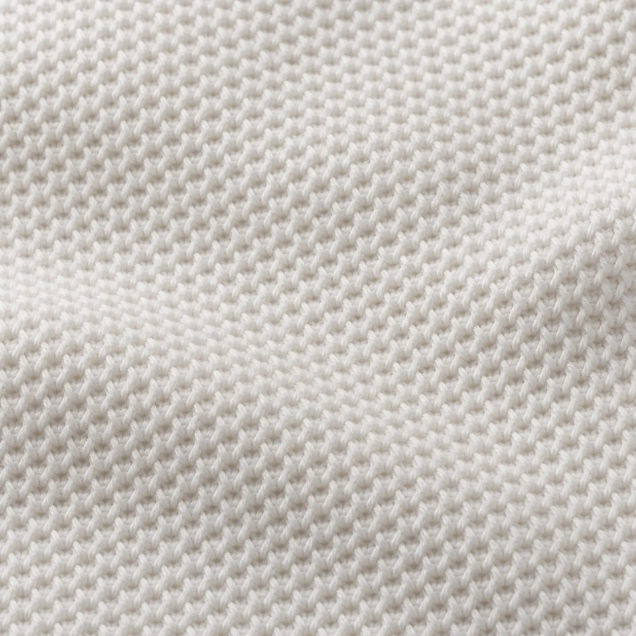 Macro de piqué blanco con textura de panal